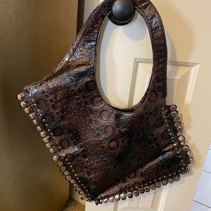Brown and silver studded hobo handbag